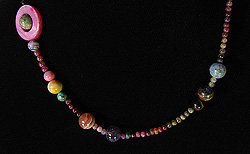 CozmicSeeds all-gemstone necklace in tourmaline for healing